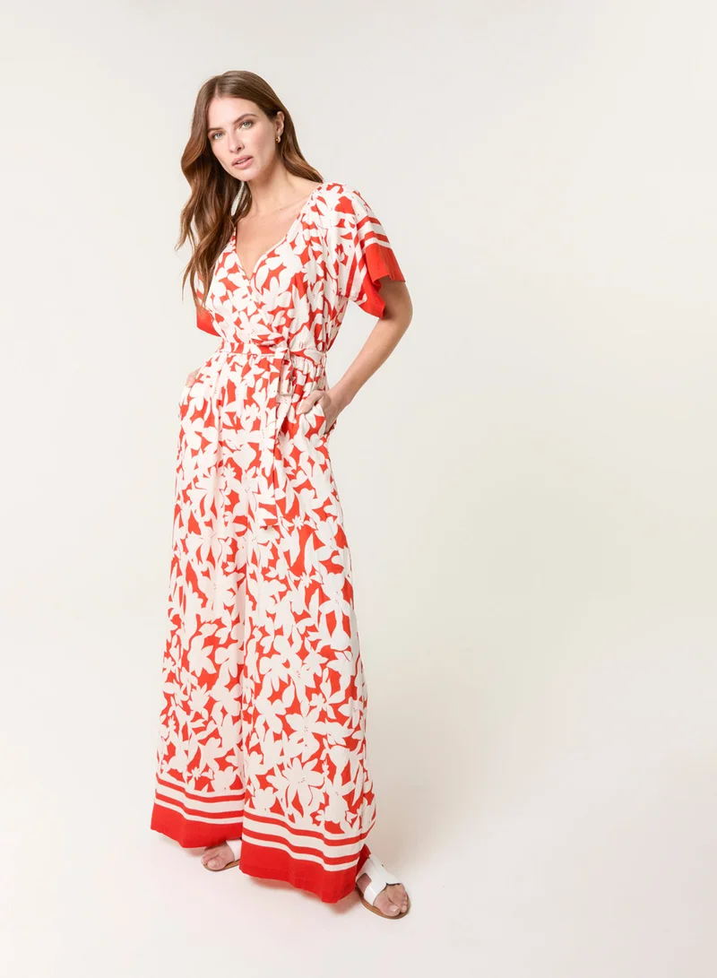 Blue Vanilla  Tropical Print Wrap Belted Waist Jumpsuit for Women | Best Price UAE